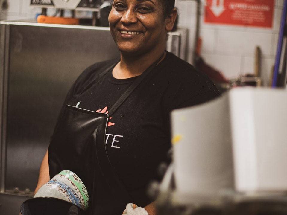 Esmeralda in the kitchen smiling at the camera