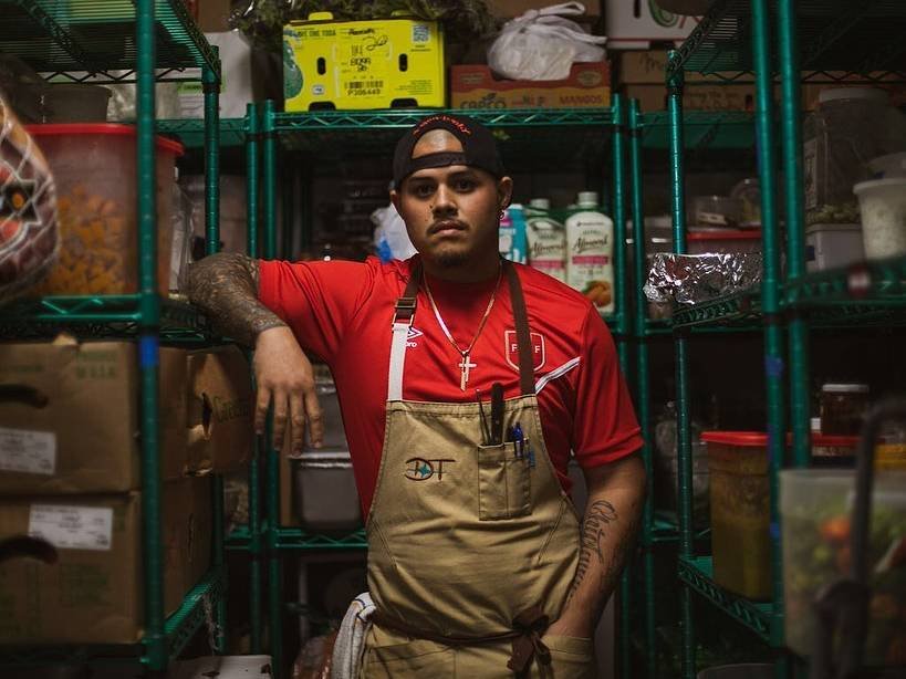 Nando Change standing on a deposit